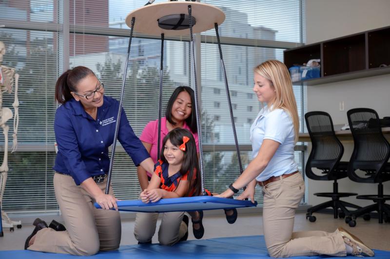 Occupational Therapy Students and Child