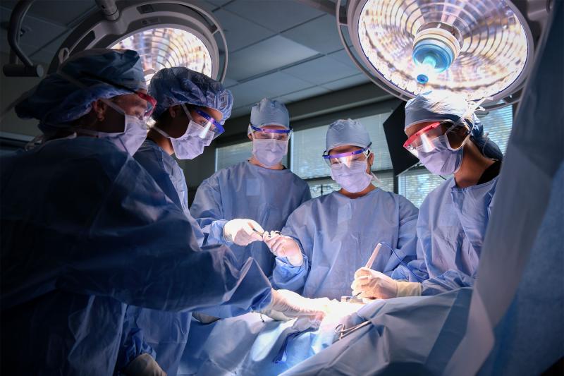 A group of physician assistant students running a surgery simulation