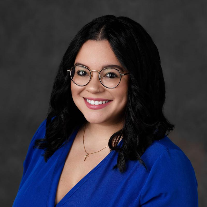 admissions manager smiling